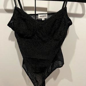 Revolve black leopard bodysuit
